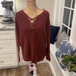 American Eagle Jegging fit rust long sleeve tied v neck sweater